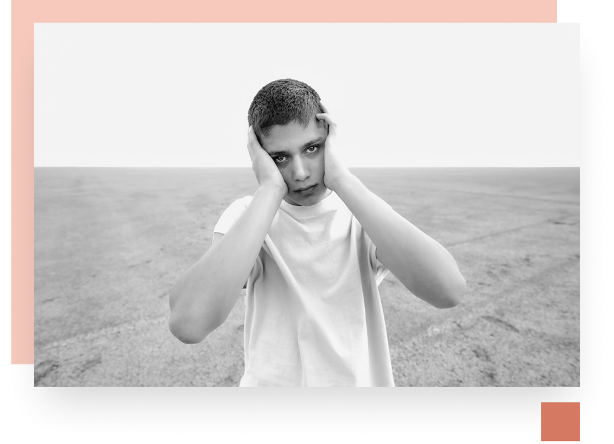Child-holding head in distress and frustration