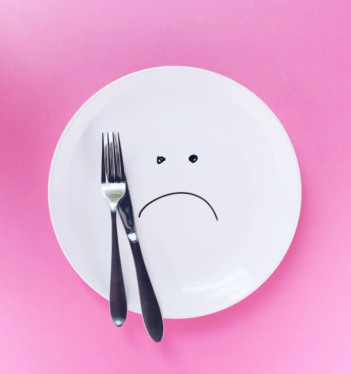 Sad-plate-on-pink-background